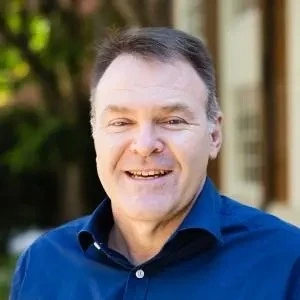 A headshot of Brian Smith