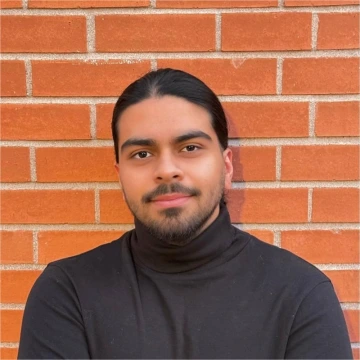 A headshot of Danial Chekani